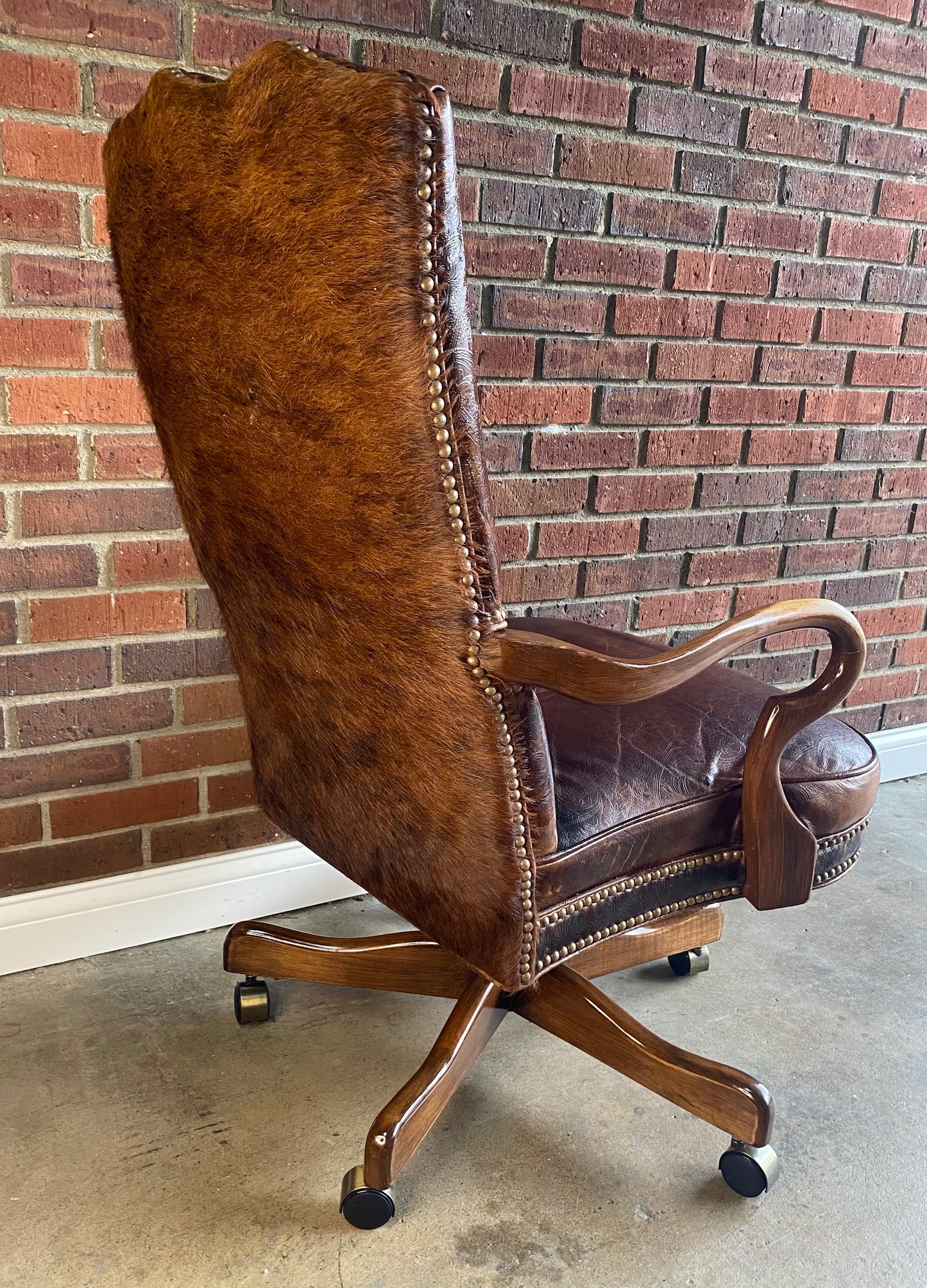 Leather and brindle hair, studded office chair by Old Hickory Furniture Co.