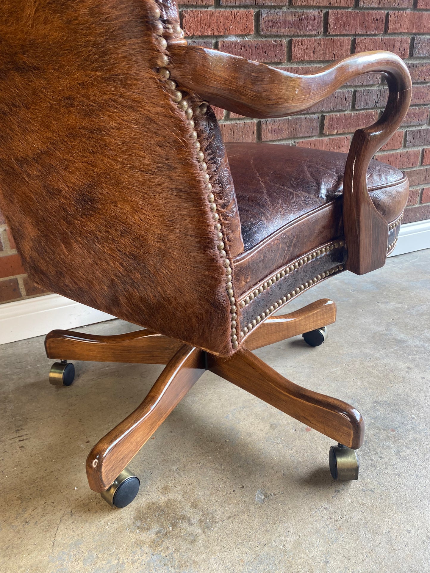 Leather and brindle hair, studded office chair by Old Hickory Furniture Co.