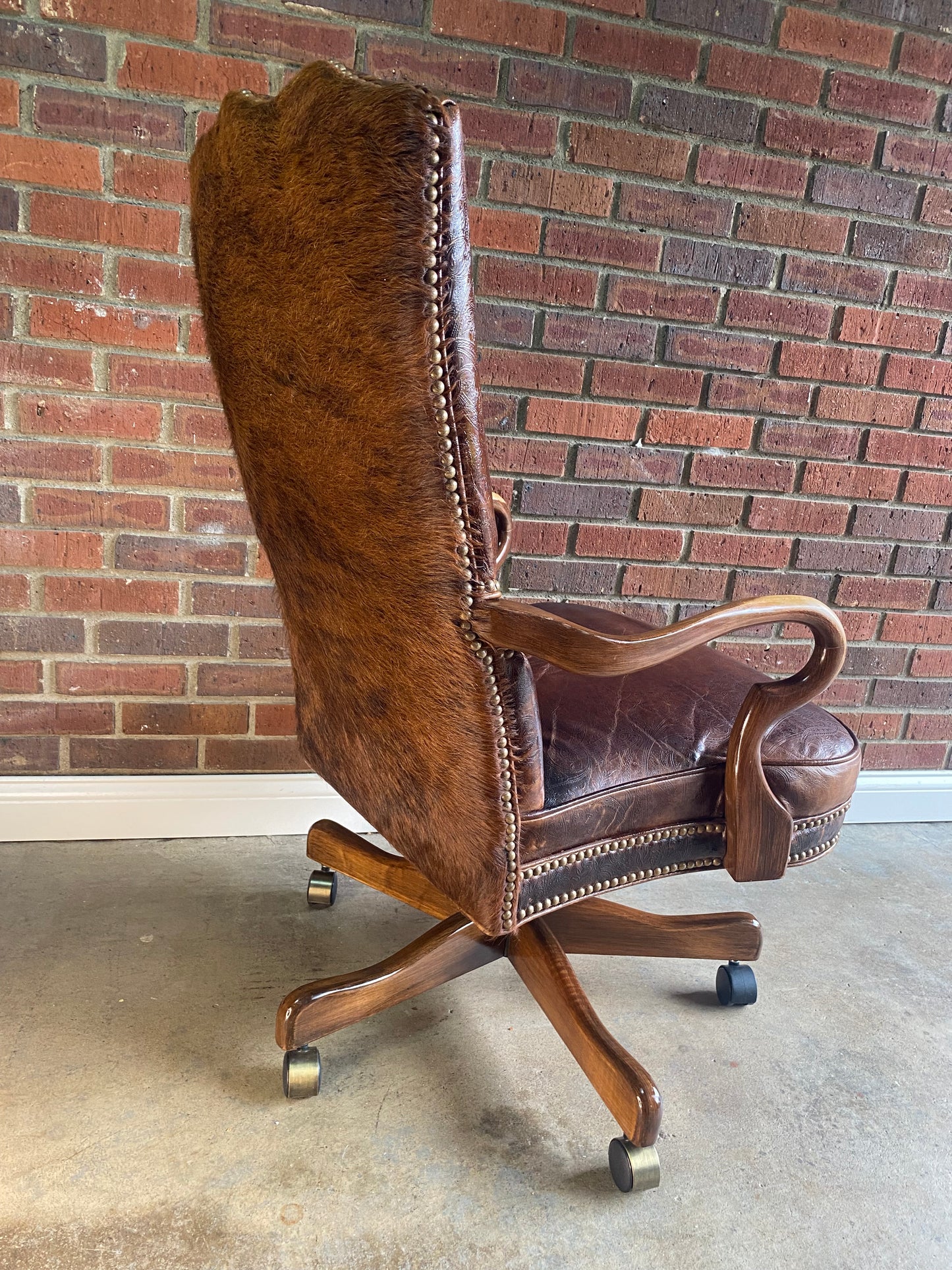 Leather and brindle hair, studded office chair by Old Hickory Furniture Co.