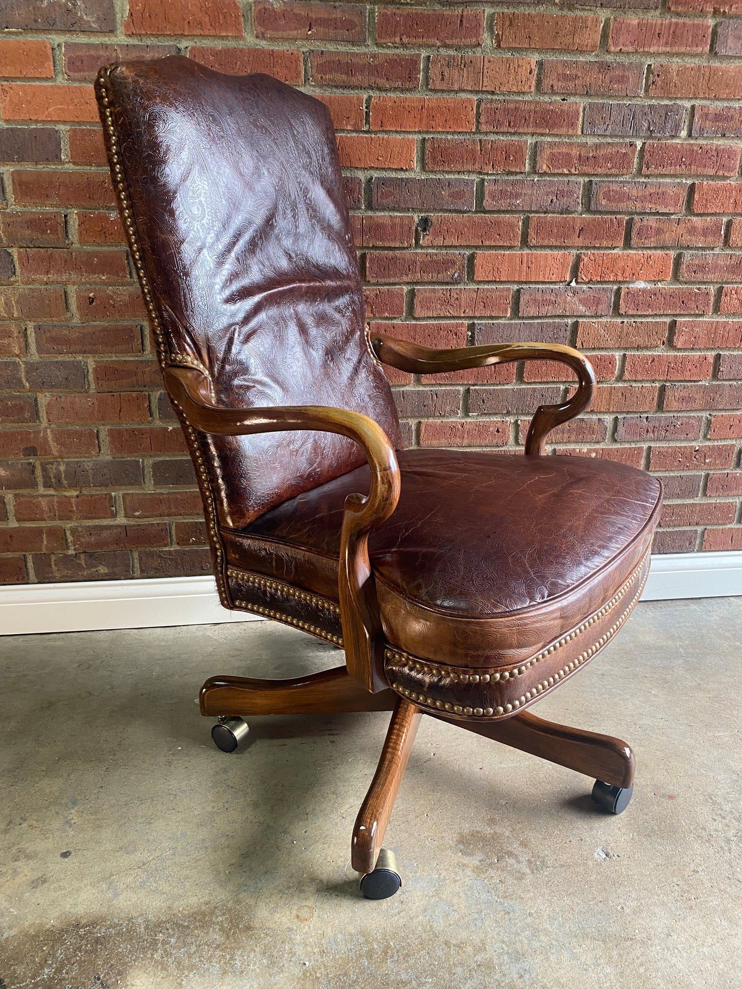 Leather and brindle hair, studded office chair by Old Hickory Furniture Co.