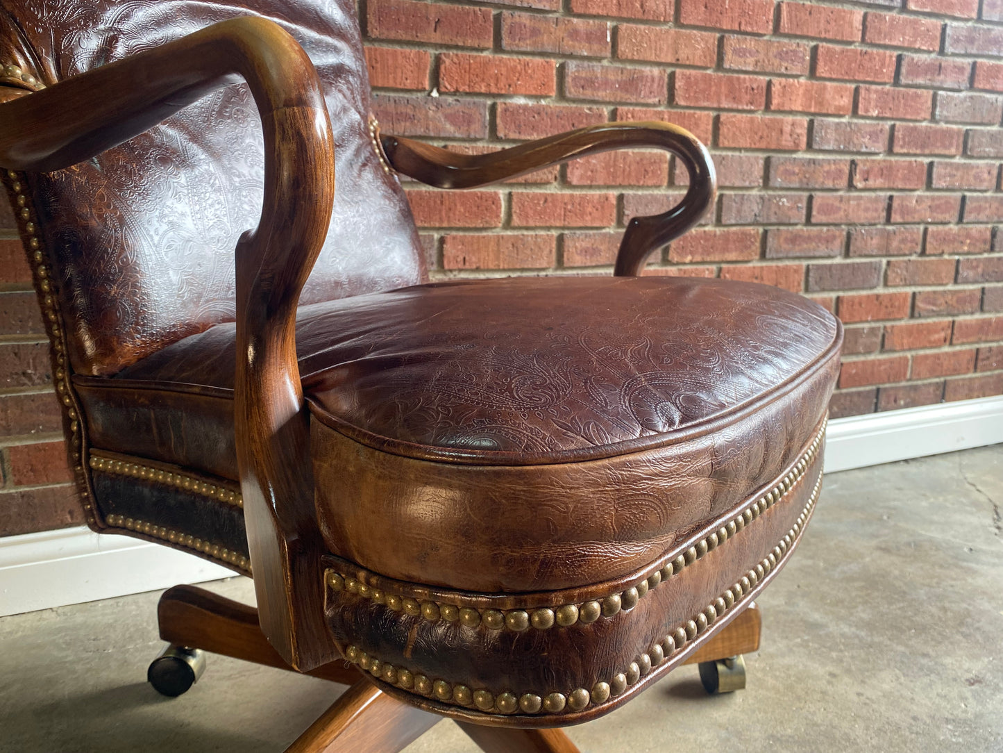 Leather and brindle hair, studded office chair by Old Hickory Furniture Co.