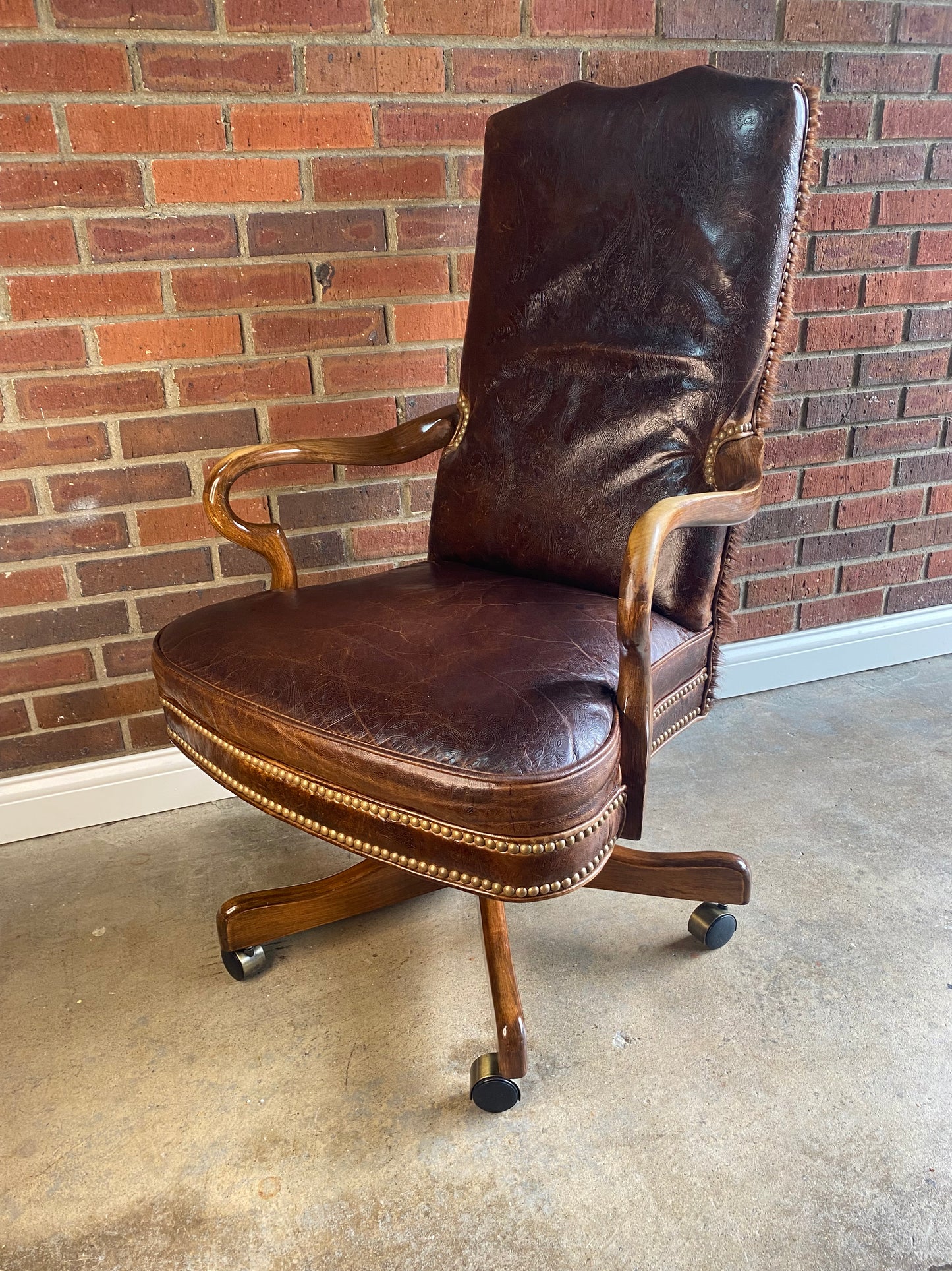 Leather and brindle hair, studded office chair by Old Hickory Furniture Co.