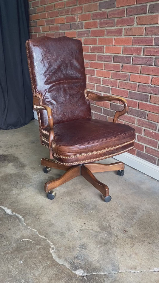 Leather and brindle hair, studded office chair by Old Hickory Furniture Co.